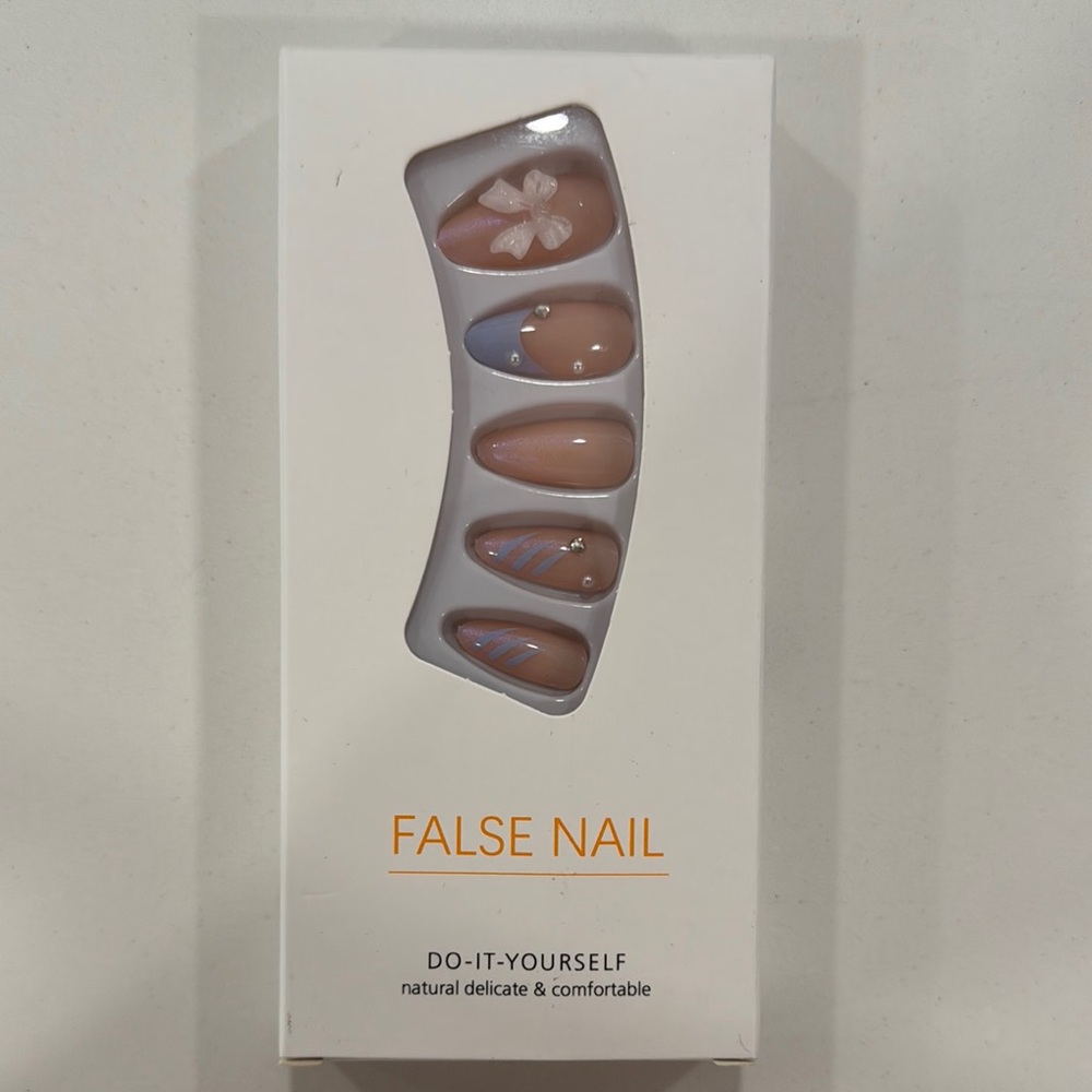DIY False Nails with accent bow design